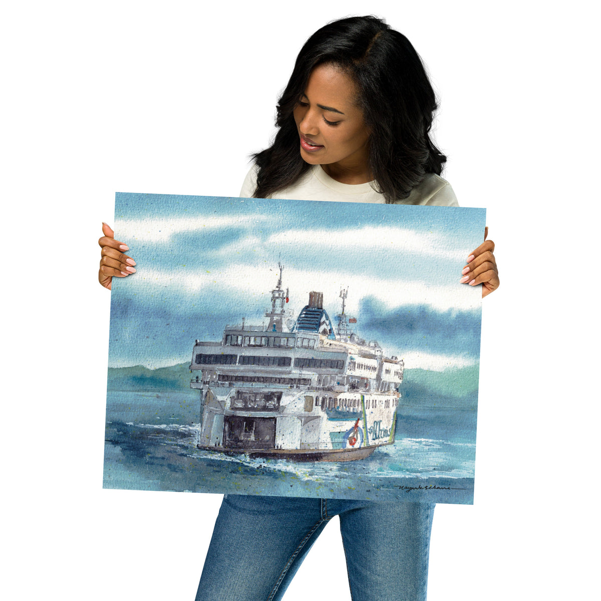 Model in a light top holding the unframed Coastal Inspiration Arriving at the Dock print at an angle; stern view of Coastal Inspiration nearing the dock through textured blue water, with a trailing wake, layered clouds and distant green mountains.