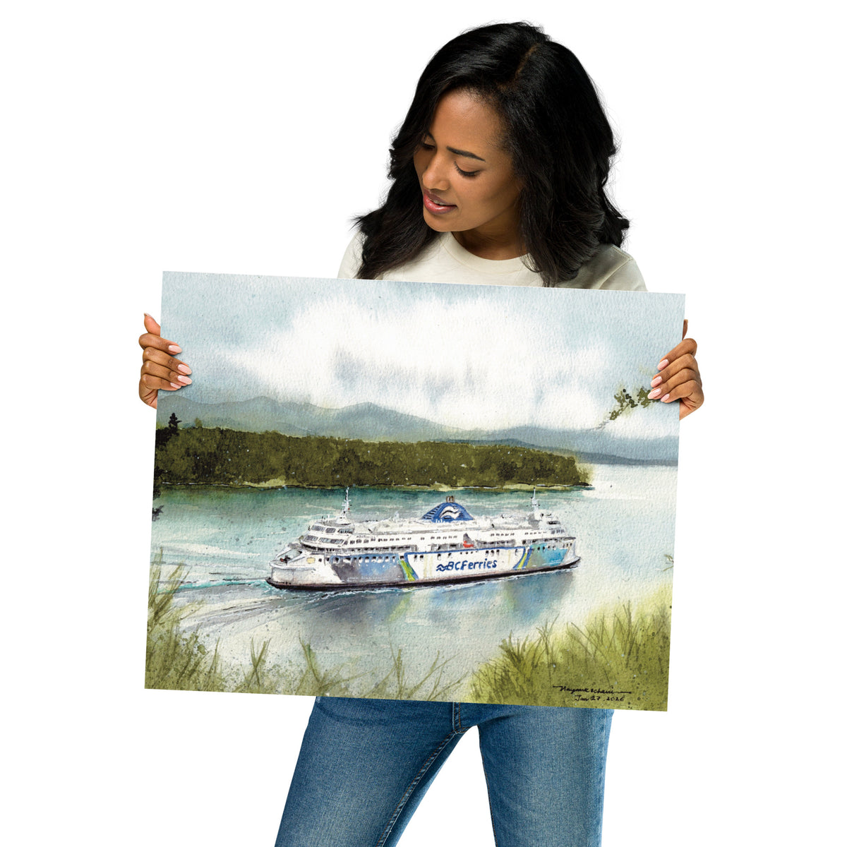Model in a light top holding the unframed Coastal Renaissance in Active Pass print at an angle; Coastal Renaissance travelling through blue-green water in Active Pass, framed by grassy shoreline, forested islands and misty mountains.
